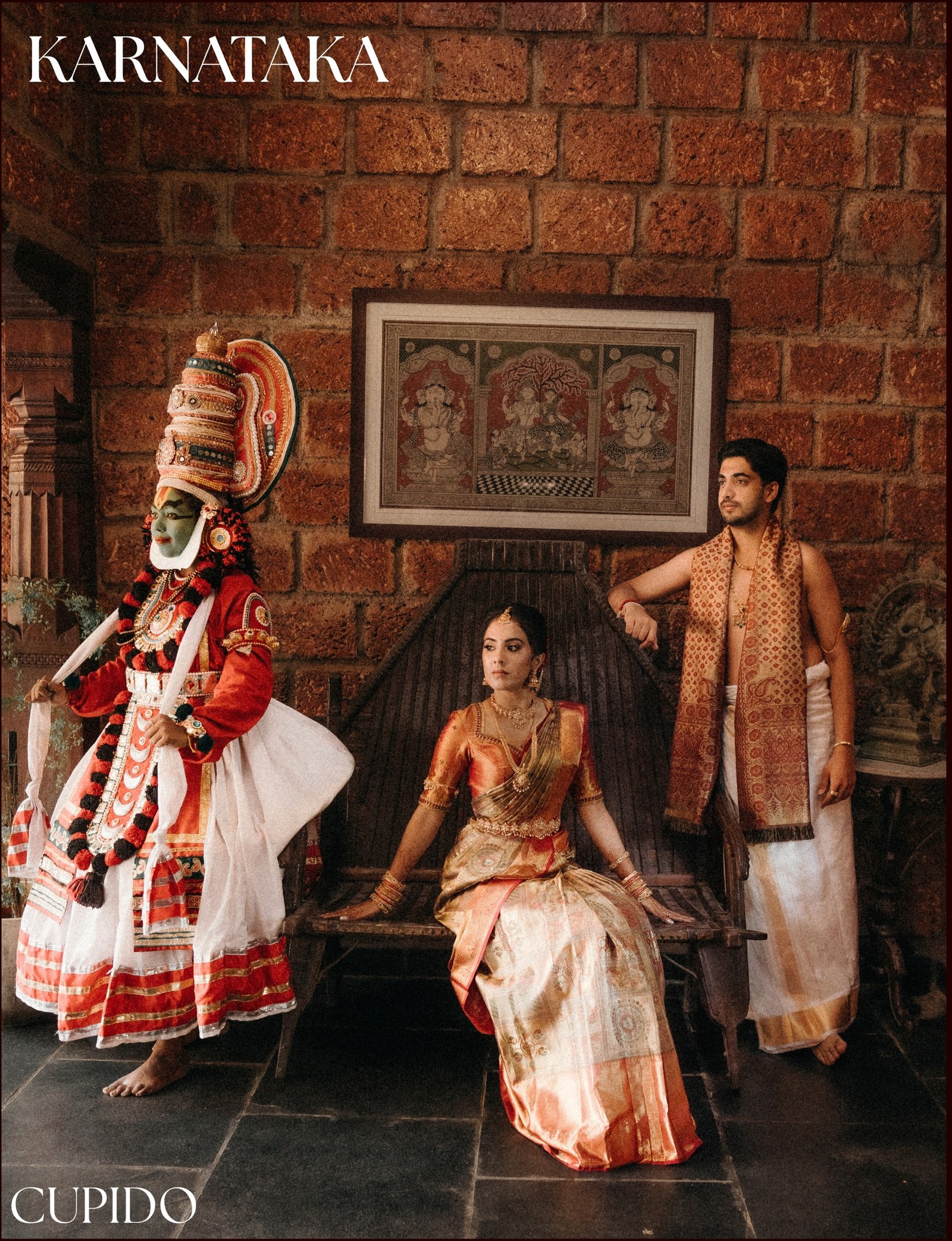 A wedding couple posing with a traditional performer